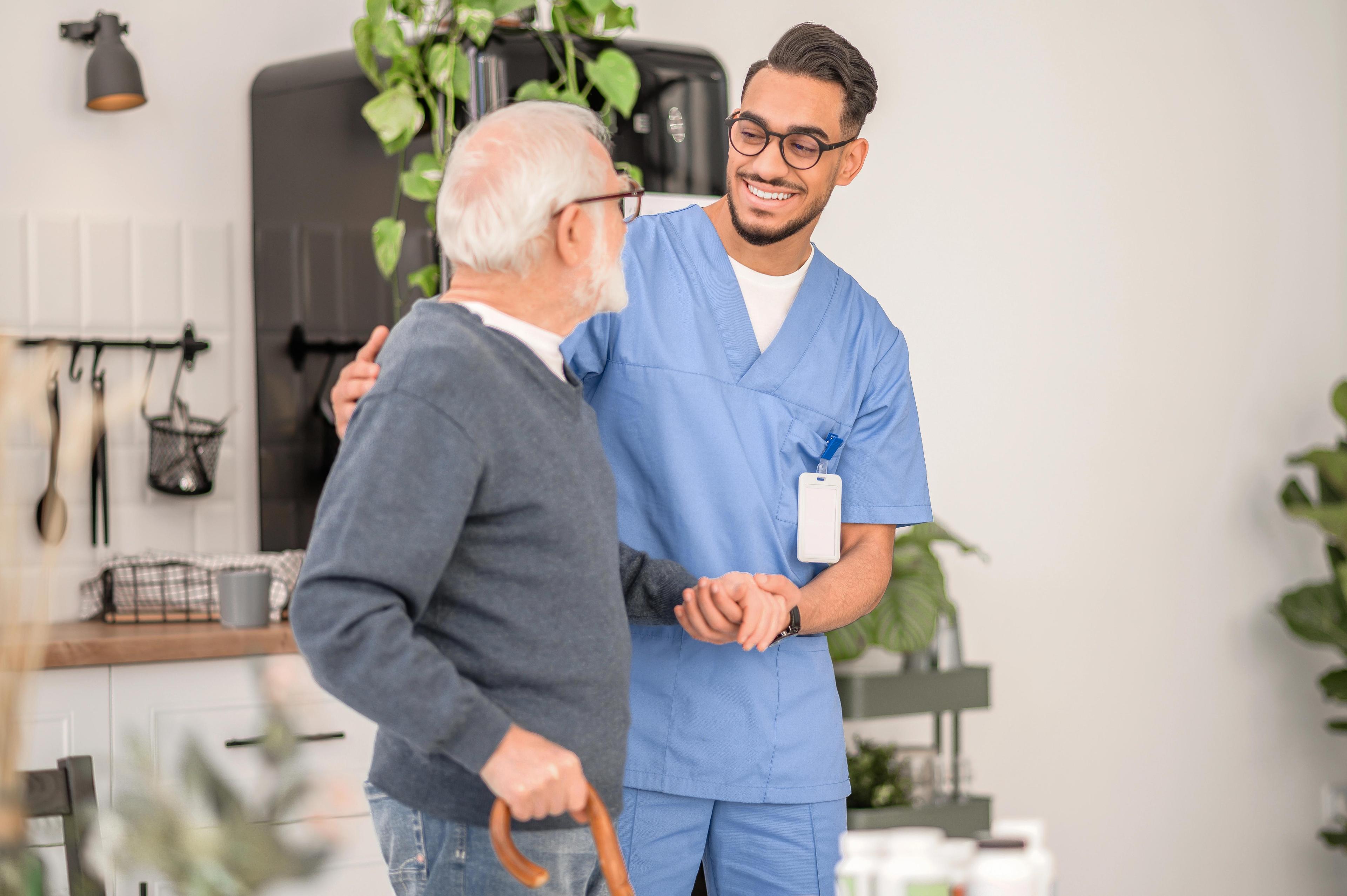 Elderly patient receiving a comprehensive health check-up from a primary care provider in Charlotte, NC